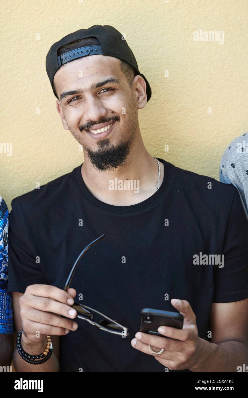 Cheerful relaxed middle eastern hi-res stock photography and images - Alamy