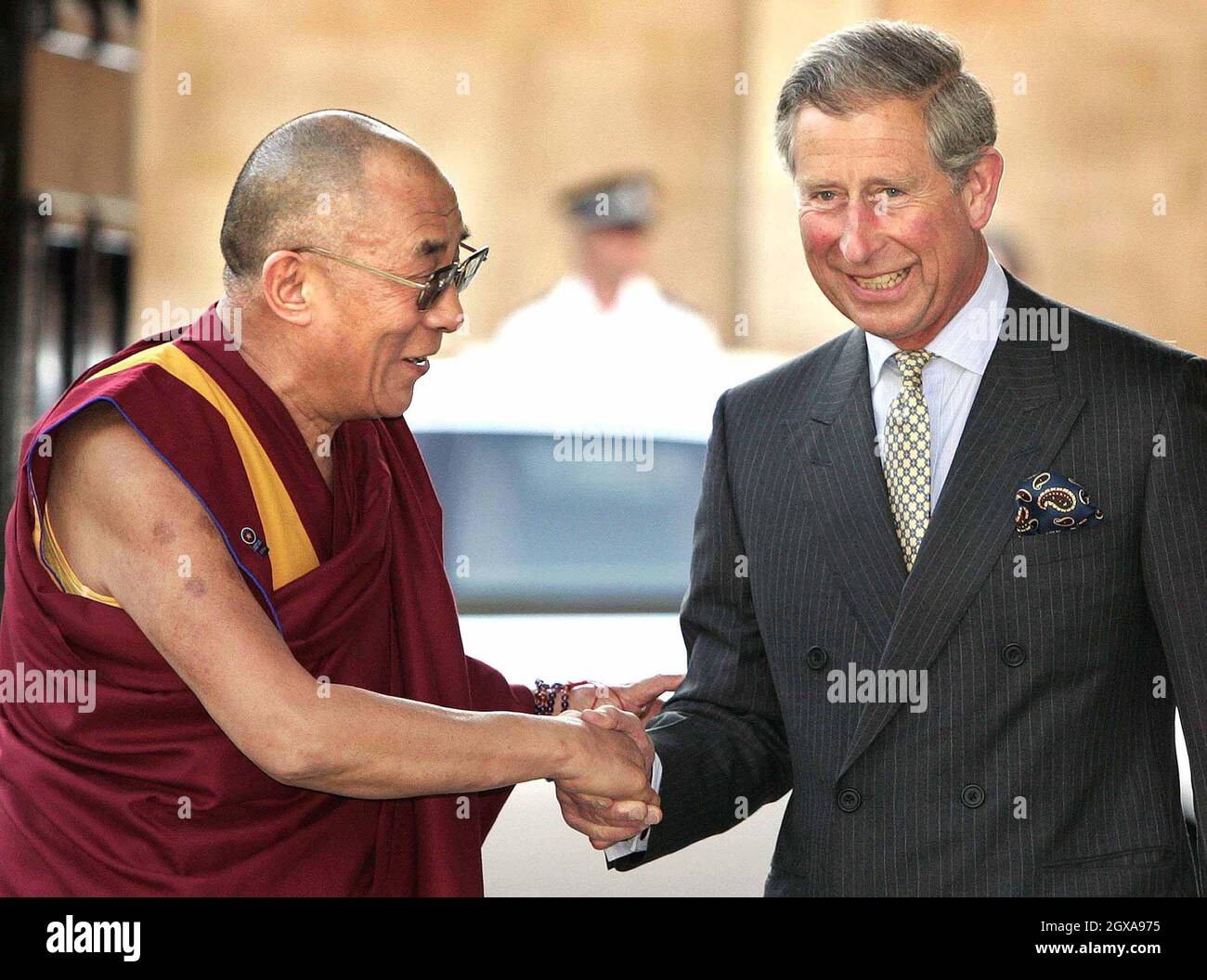 Britain's Prince Charles greets the 14th Dalai Lama, Tenzin Gyatso, at a reception in London. The exiled Tibetan spiritual leader is on a four day visit to Britain. China, which imposed communist rule on Tibet in 1950 and claims it as part of its territory, accuses the religious leader of separatist activities.  Stock Photo