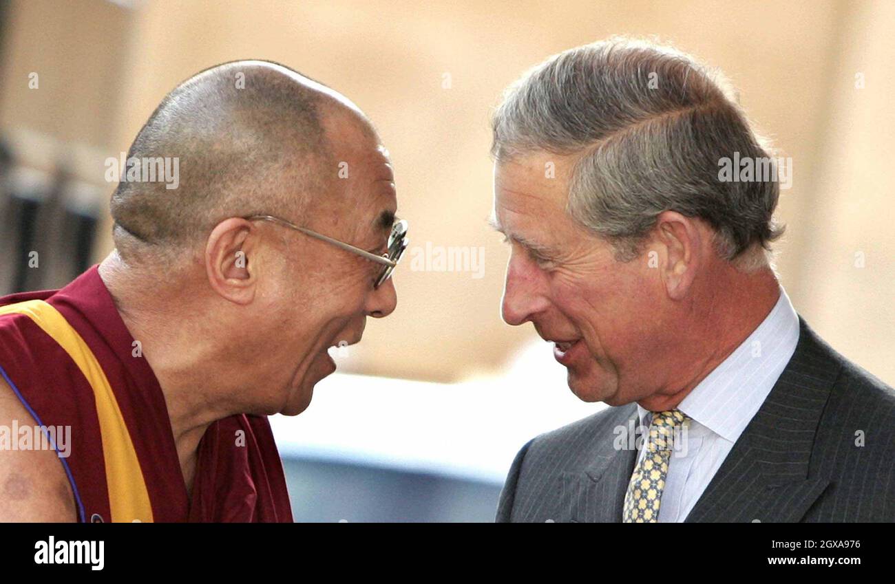 Britain's Prince Charles greets the 14th Dalai Lama, Tenzin Gyatso, at a reception in London. The exiled Tibetan spiritual leader is on a four day visit to Britain. China, which imposed communist rule on Tibet in 1950 and claims it as part of its territory, accuses the religious leader of separatist activities.  Stock Photo