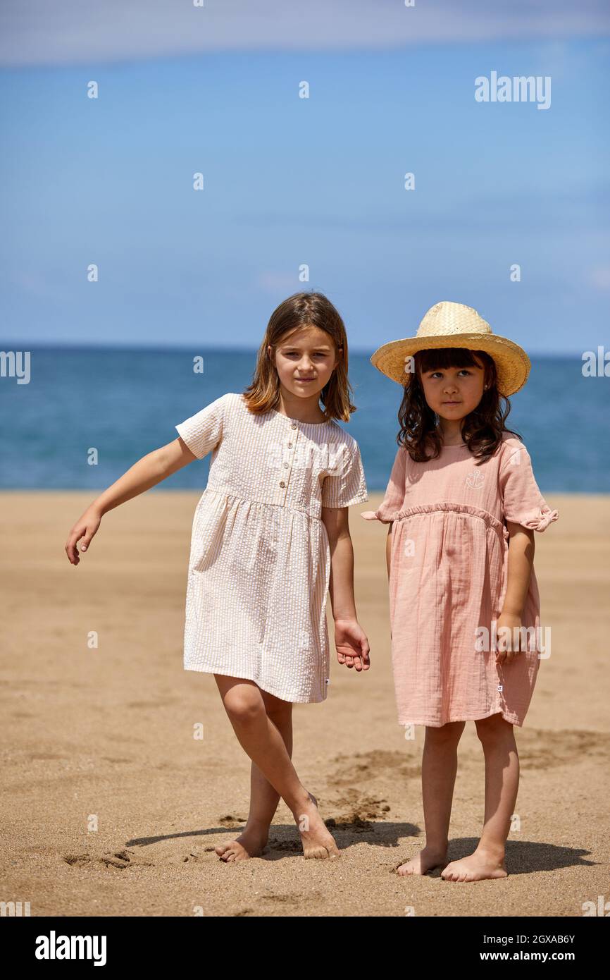 Girls on the beach, Zumaia, Gipuzkoa, Basque Country, Spain Stock Photo