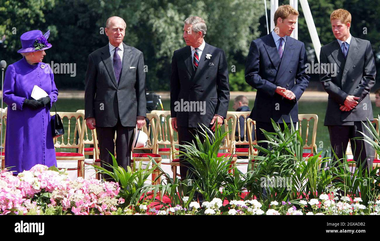 Britain's Queen Elizabeth stands with her husband Prince Philip, son
