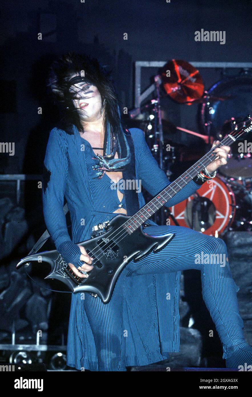 Nikki Sixx, bass player for the Motley Crue, performing live in