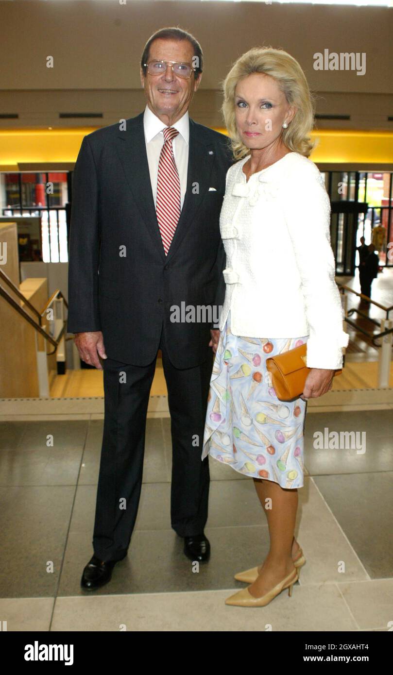 Sir Roger Moore and wife Christina Tholstrup at the press conference held  at the British Library in London marking the forthcoming world wide celebration of the bicentenary of the birth of Hans Christian Andersen. The celebrations will take place in  2005. Prior to marrying HRM Crown Prince Frederik of Denmark, Mary Elizabeth Donaldson worked in real estate in Tasmania. Stock Photo