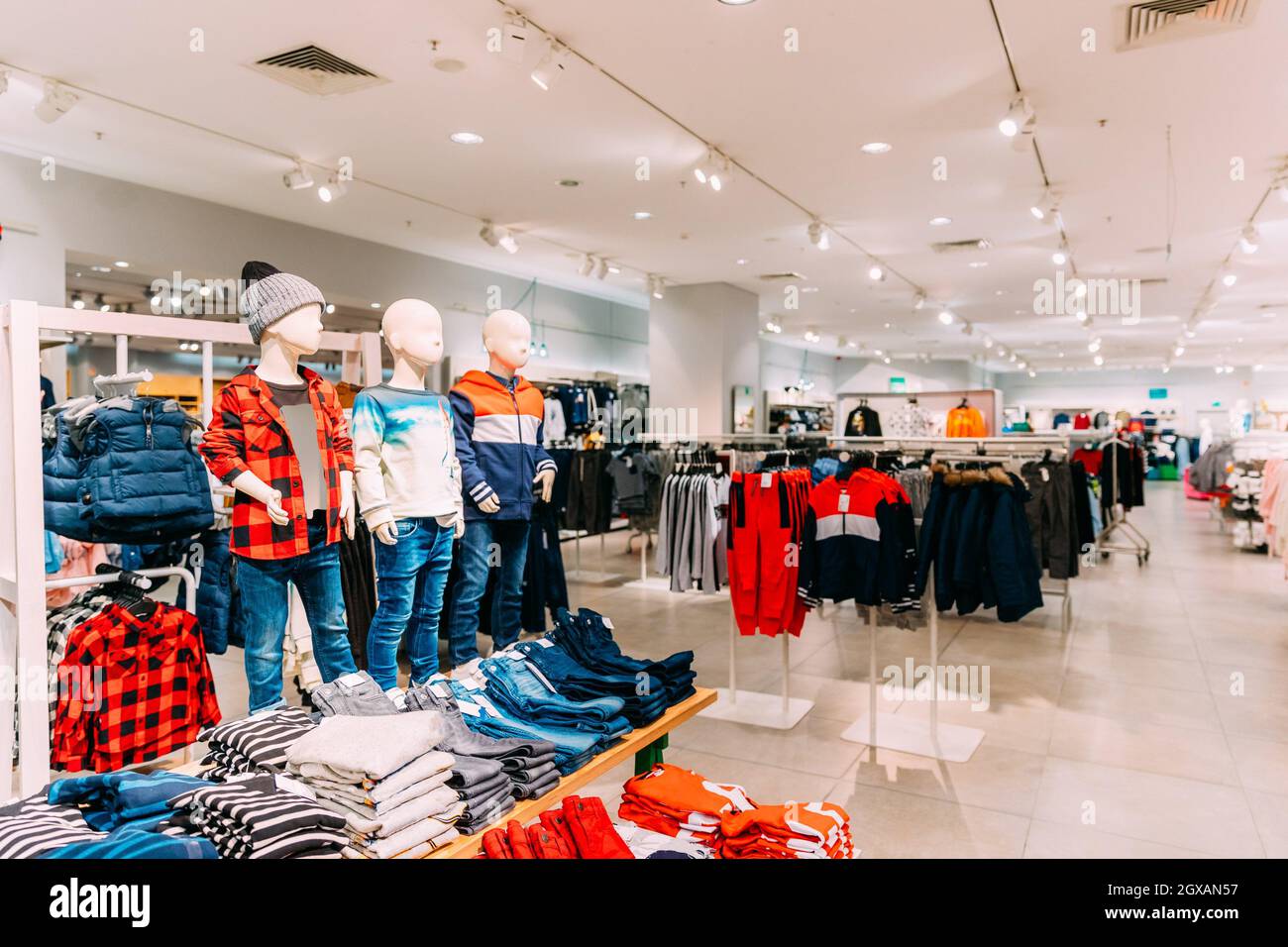 Mannequins Dressed In Children Male Man Casual Clothes And Colorful Bright  Children Clothes On Shelves And Hanger In Store Of Shopping Center Stock  Photo - Alamy