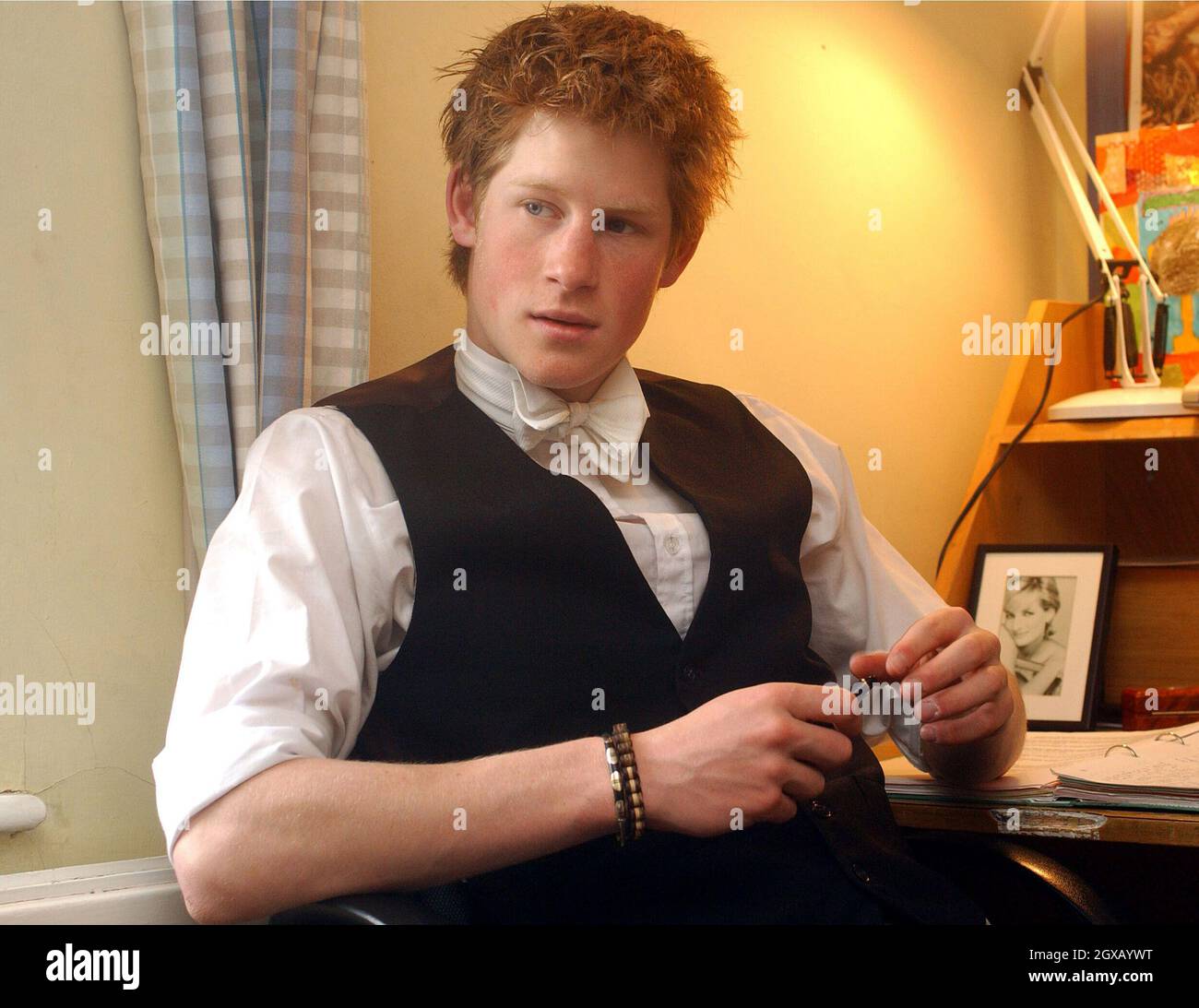 Archive picture of Prince Harry  in his room at  at Eton College in March 2003 . The 'playboy' prince has made the headlines once again, after attending a fancy dress party  with a nazi swastika on his arm. The lastest scandal follows a succession incidents which have seen the 20 year old prince caught smoking cannabis as a teenager to his more recent nightclub scuffle with a paparazzi photographer. Anwar Hussein/allactiondigital.com   Stock Photo