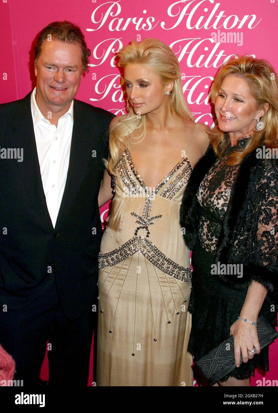 Paris Hilton with her parents Kathy and Rick Hilton at a fragrance launch  in New York Stock Photo - Alamy