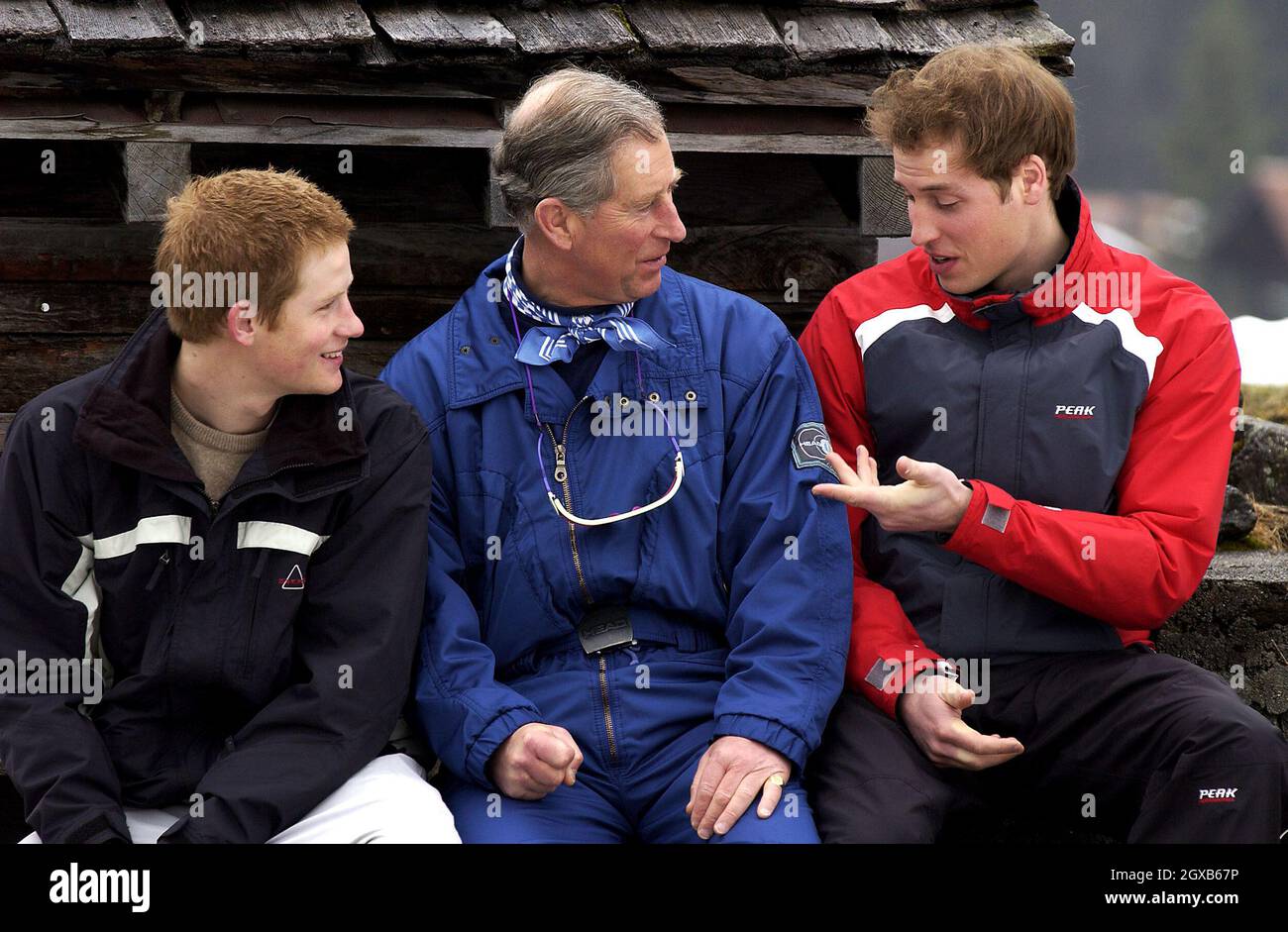 A grumpy Prince Charles,Prince of Wales looks as though he has pre wedding nerves  as he mutters rudely  about the press and then looks bemused when PrinceWilliam and Prince Harry point out that his microphone is on, during a photocall in Klosters, Switzerland on 31/03/05. Anwar Hussein/allactiondigital.com   Stock Photo