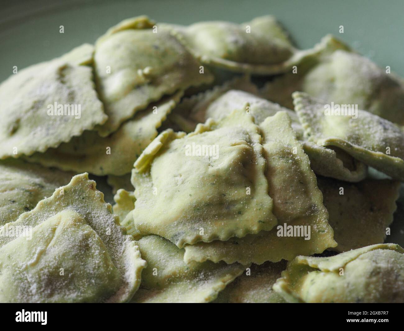 vegetarian agnolotti with ricotta cheese and herbs, traditional Italian pasta food. Stock Photo