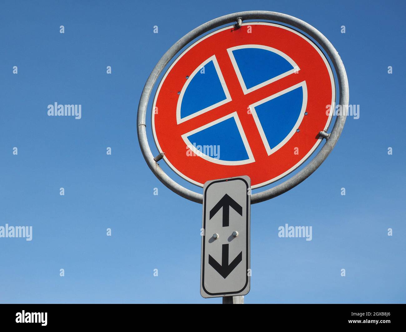 no parking and no stopping traffic sign over blue sky with copy space. Stock Photo