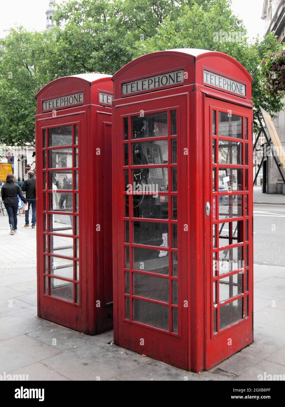 Traditional red telephone box in London UK. Stock Photo