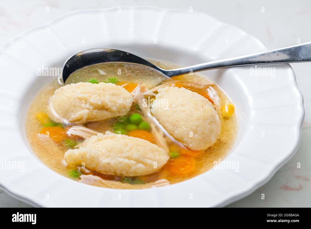 chicken broth with semolina dumplings and vegetables Stock Photo Alamy