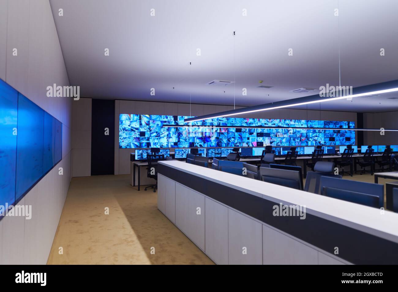 Empty interior of big modern security system control room, workstation with  multiple displays, monitoring room with at security data center Empty off  Stock Photo - Alamy