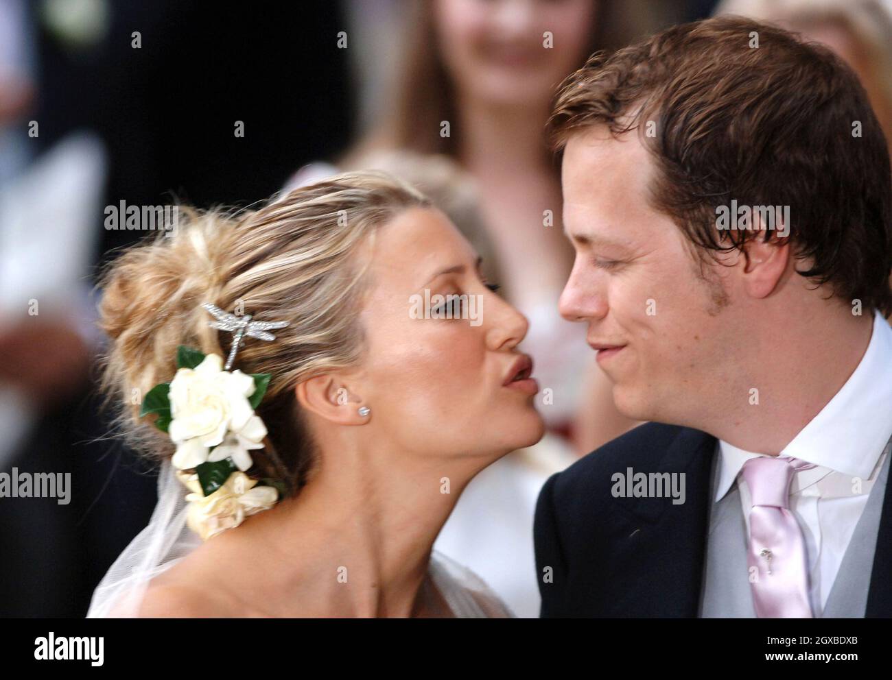 Tom Parker-Bowles and his new wife Sara kiss as they leave St. Nicholas's Church after their wedding ceremony in Henley-on-Thames, England.  Anwar Hussein/allactiondigital.com  Stock Photo