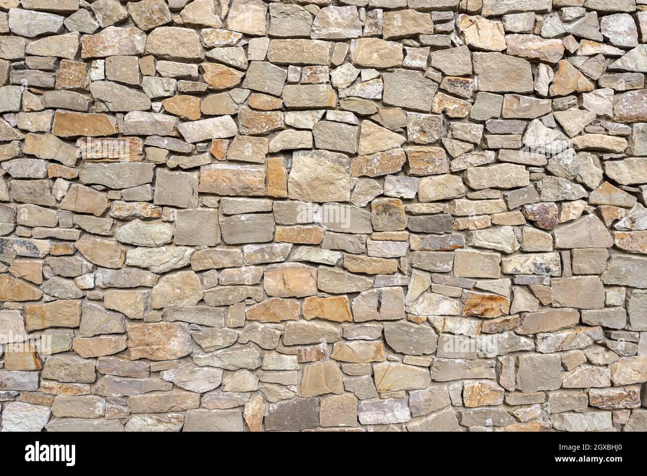 Old Stone wall. Ideal for textures and backgrounds. Stock Photo