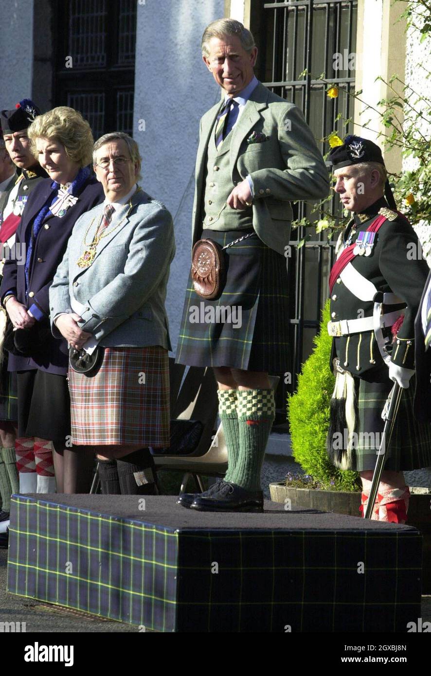 The Prince Of Wales, the Duke of Rothesay, at the Gordon Highlanders Museum in Aberdeen where he views a parade during a ceremony  to lay up the Regiment's last colours.   Stock Photo
