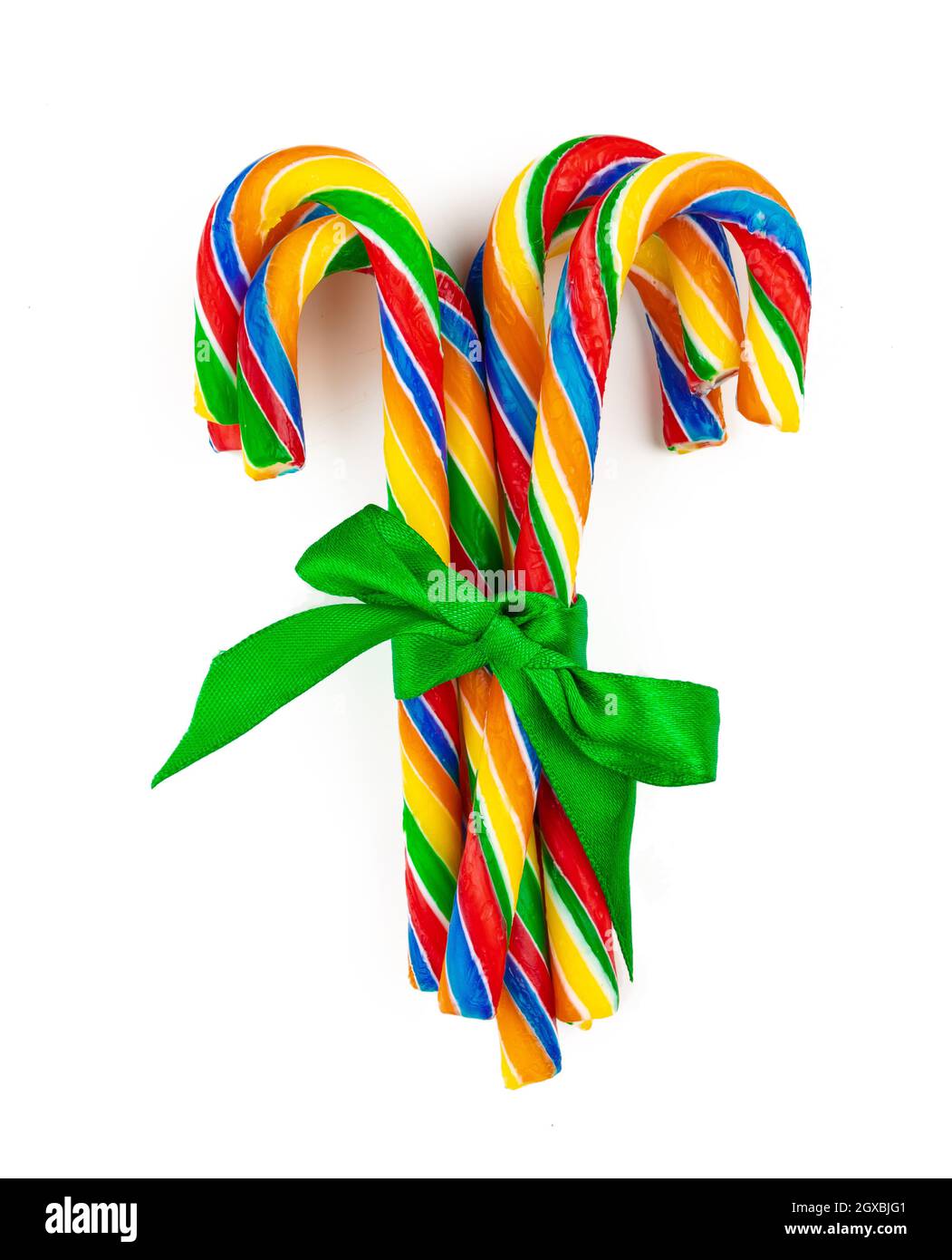 Rainbow colored candy cane isolated on white background Stock Photo Alamy
