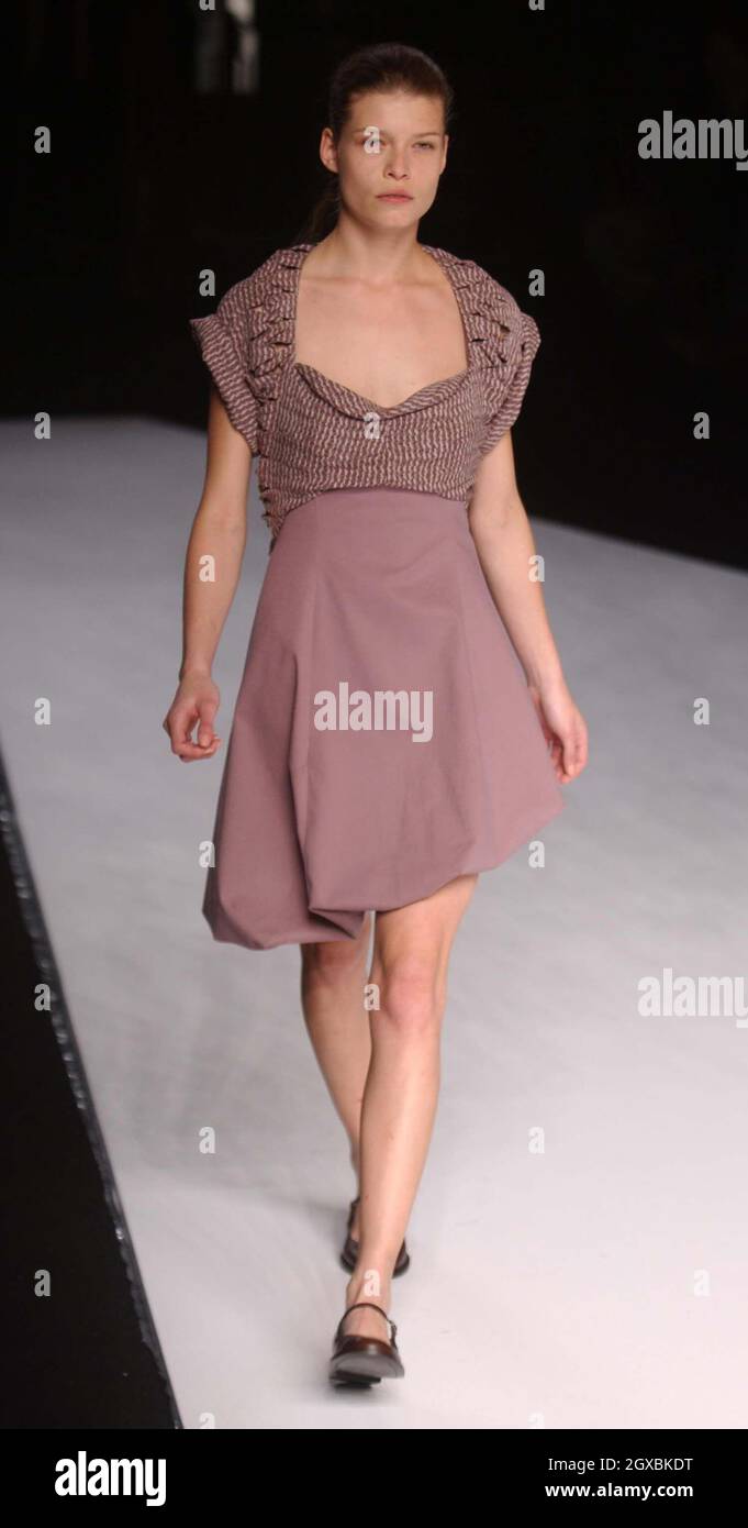 Models on the catwalk for The Hussein Chalayan Fashion Show at Paris Fashion Week. Stock Photo