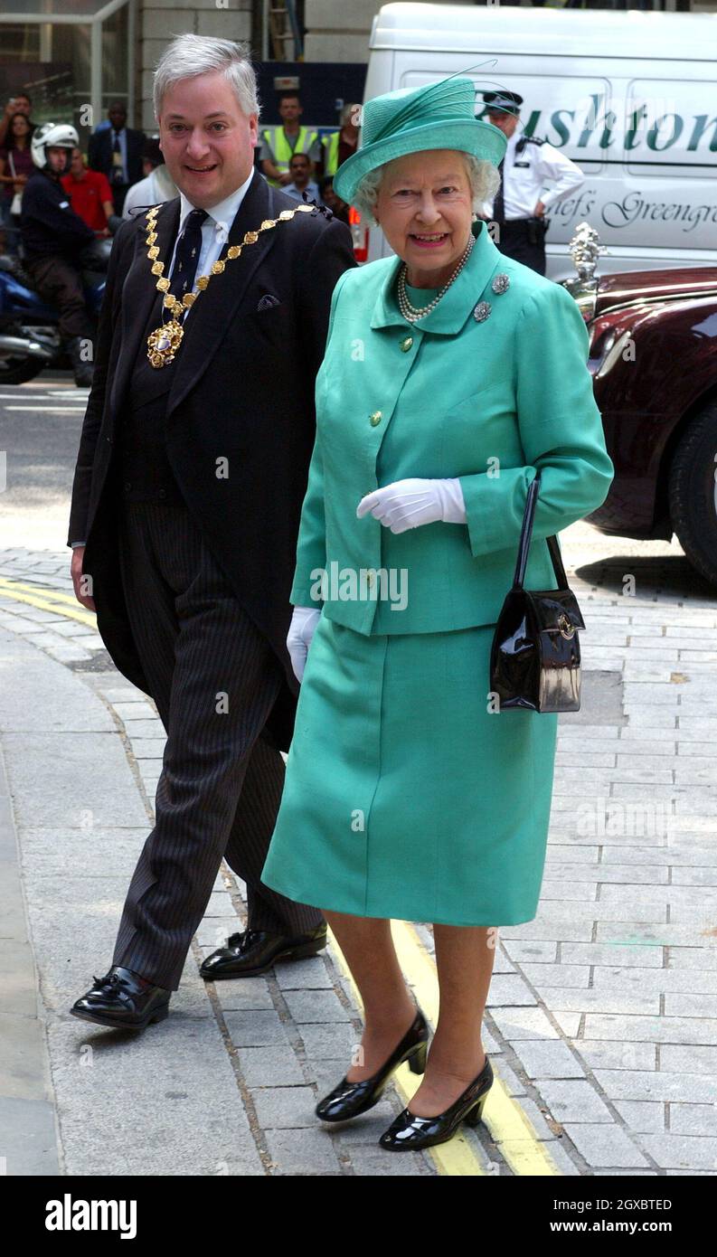 Queen Elizabeth II arrives with The Lord Mayor of Westminster, Alexander Nicoll. Stock Photo