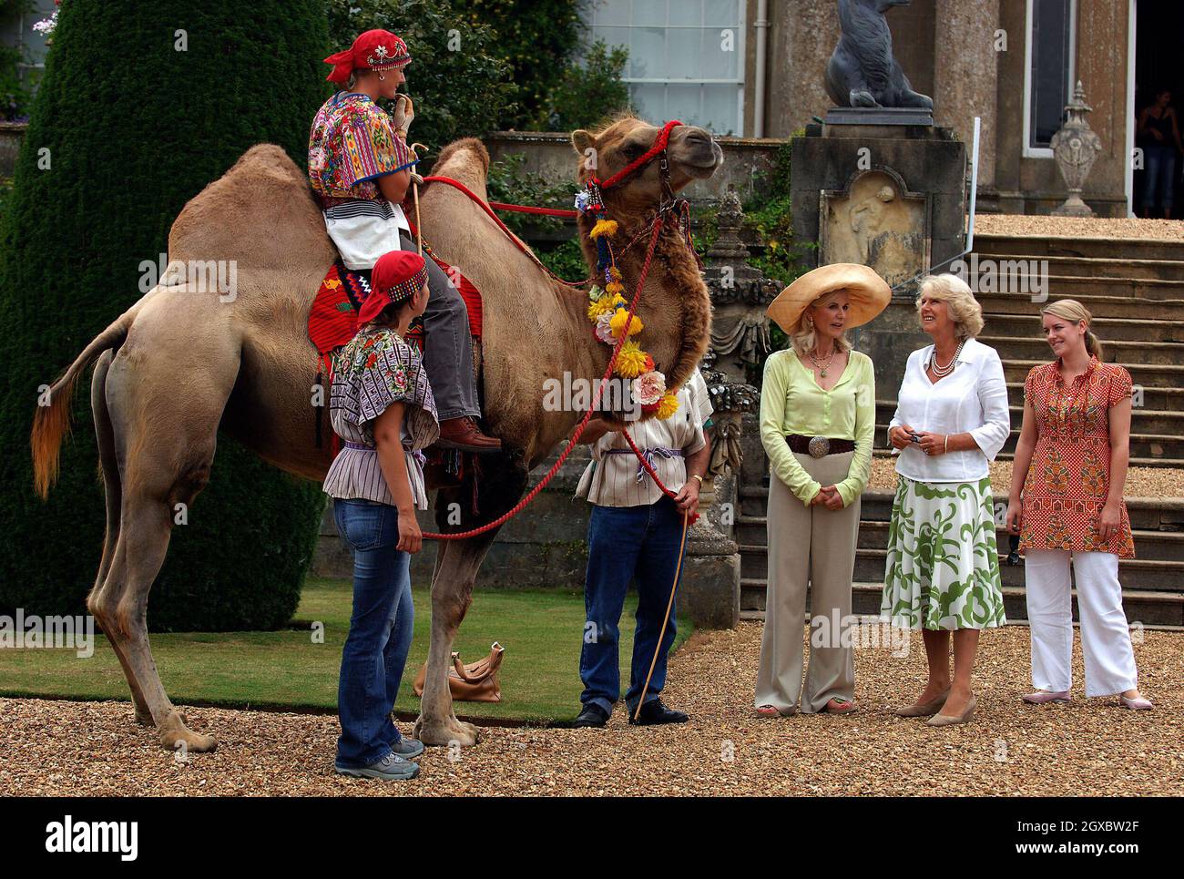 Camilla, Duchess of Cornwall is by her two pet dogs and her daughter Laura Lopes