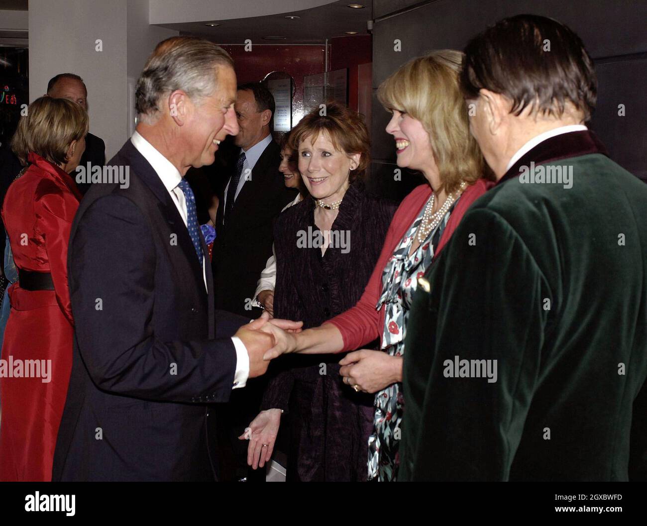 Prince Charles, Prince of Wales meets Joanna Lumley and Barry Humphries at the John Betjeman Centenary Gala in The Prince of Wales Theatre, London on September 10, 2006. Anwar Hussein/EMPICS Entertainment Stock Photo