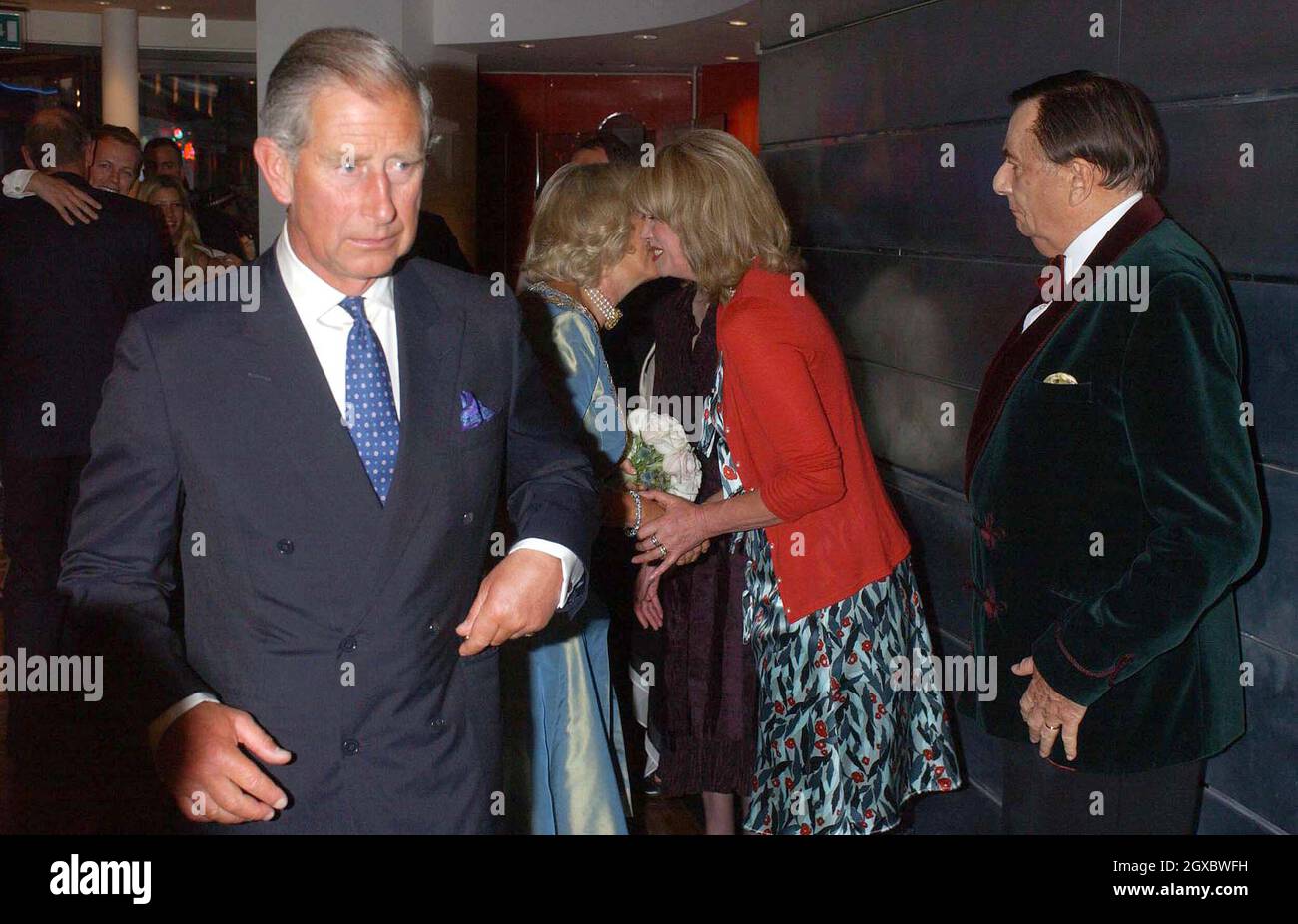 Prince Charles, Prince of Wales and Camilla, Duchess of Cornwall meet Joanna Lumley and Barry Humphries at the John Betjeman Centenary Gala in The Prince of Wales Theatre, London on September 10, 2006. Anwar Hussein/EMPICS Entertainment Stock Photo