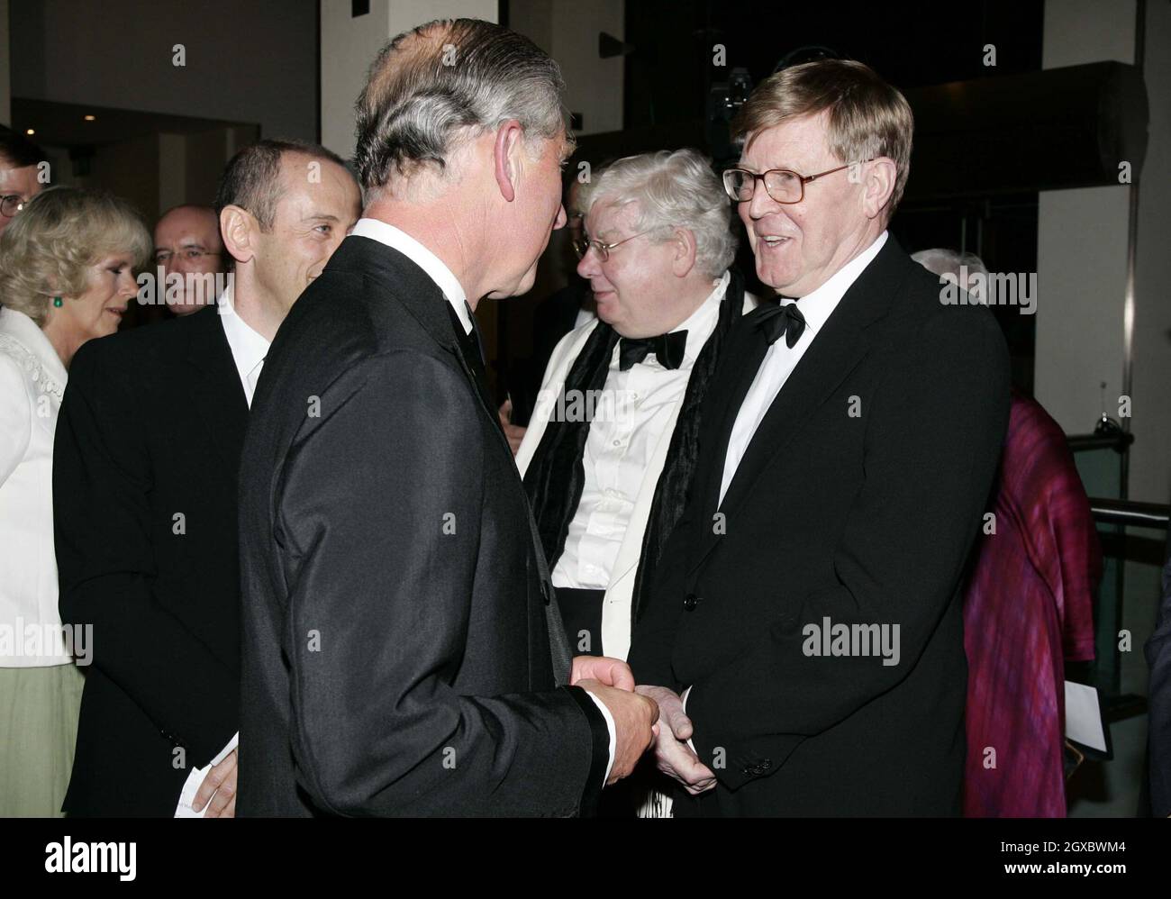 Prince Charles, Prince of Wales and Camilla, Duchess of Cornwall meet writer Alan Bennett and actor Richard Griffiths at the premiere of The History Boys in Leicester Square, London on October 2, 2006. Anwar Hussein/EMPICS Entertainment  Stock Photo