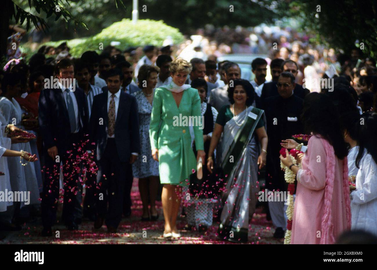 Diana, Princess of Wales smiles as she has petals thrown at her during her visit to Lahore, Pakistan in October 1991. Anwar Hussein/EMPICS Entertainment  Stock Photo