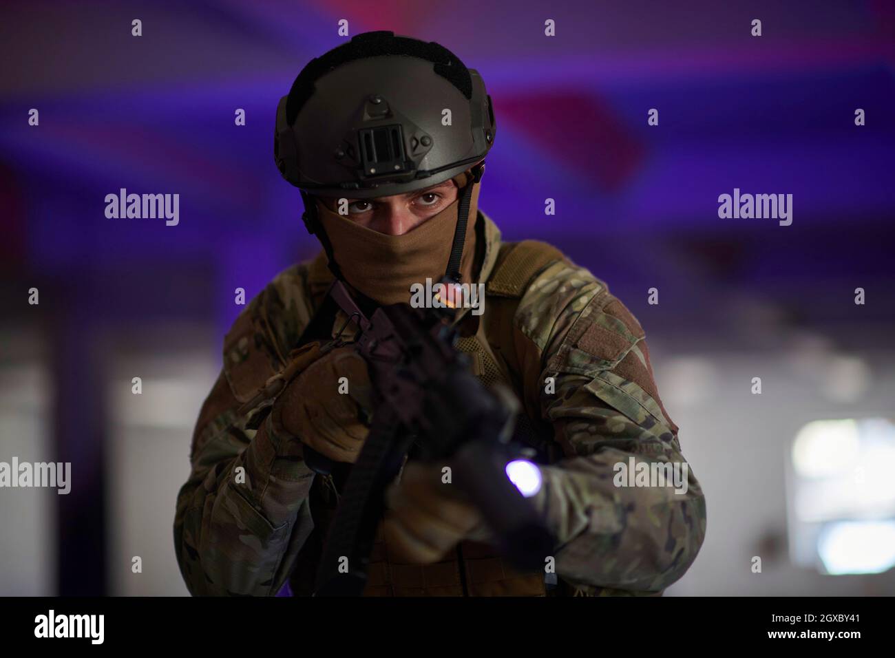 modern warfare soldier in urban environment  battlefield aiming on weapons and scanning for target Stock Photo
