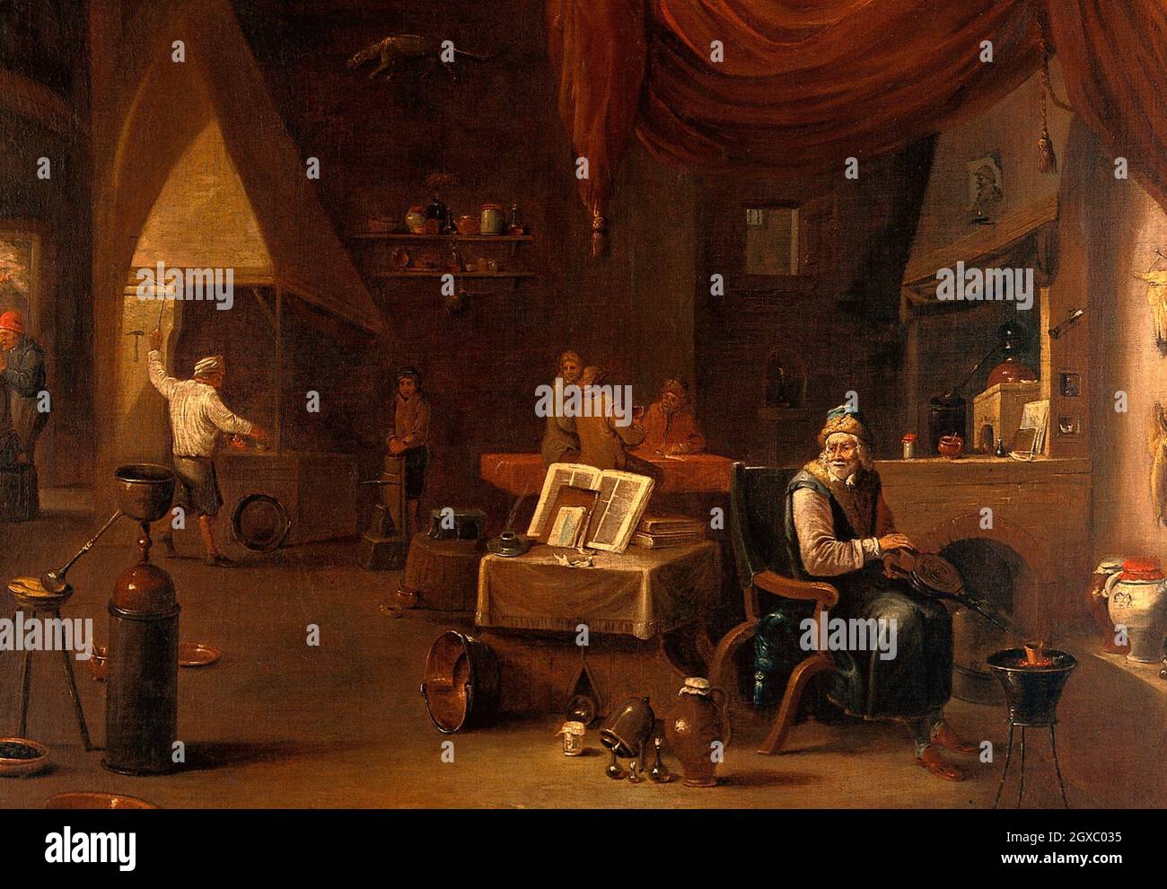 An alchemist in his laboratory. Oil painting. Alchemy (from Arabic: al-kimiya; from Ancient Greek: khumeía) is an ancient branch of natural Stock Photo