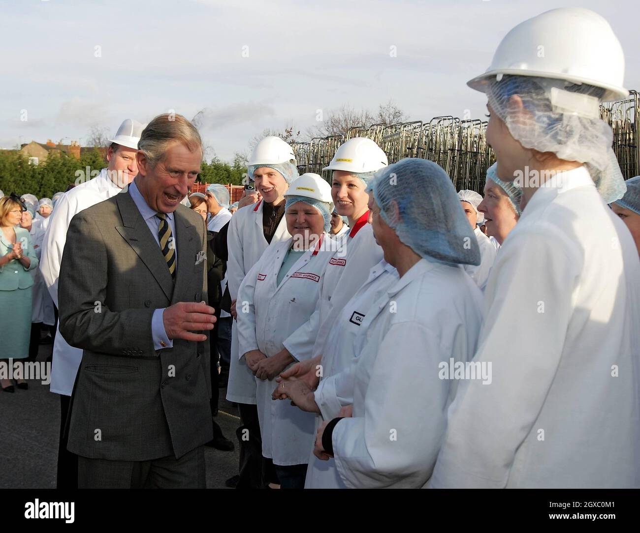 Prince Charles, Prince of Wales meets staff during a visit to the