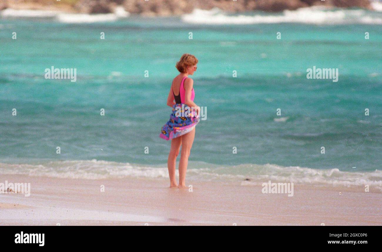 Diana, Princess of Wales, wearing a swim suit, paddles in sea while on holiday in April 1990 in the Virgin Islands. Anwar Hussein/EMPICS Entertainment Stock Photo