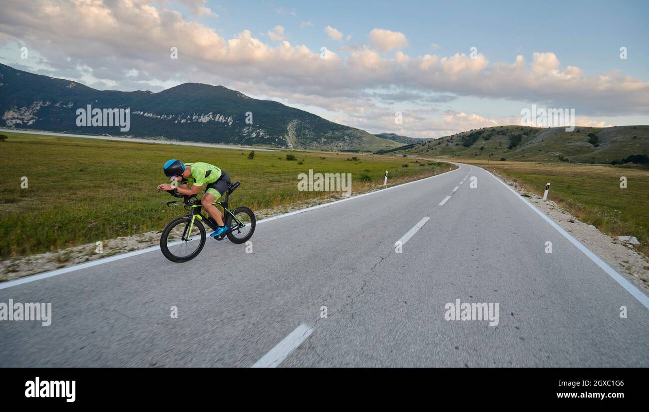 Professional triathlete on her road bike hi-res stock photography and ...