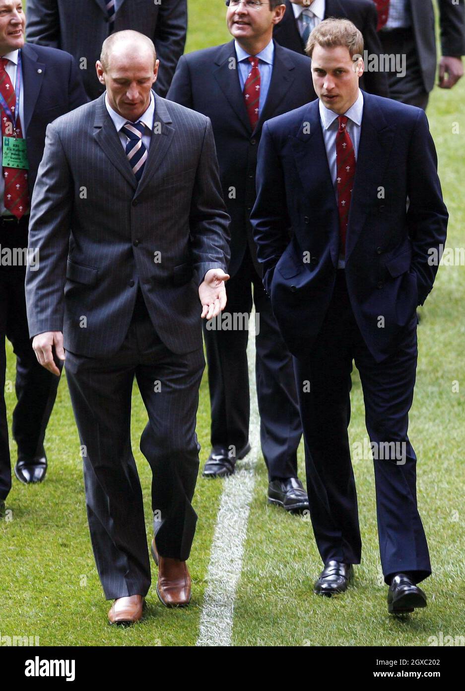 Prince William walks on the pitch with Welsh rugby player Gareth Thomas at the Millennium Stadium, Cardiff on February 4, 2007. Prince William officially took up his role as Vice Royal Patron of the Welsh Rugby Union. The prince was at the Millennium Stadium in Cardiff to see Wales play Ireland in their opening game of the Six Nations tournament. Anwar Hussein/EMPICS Entertainment Stock Photo
