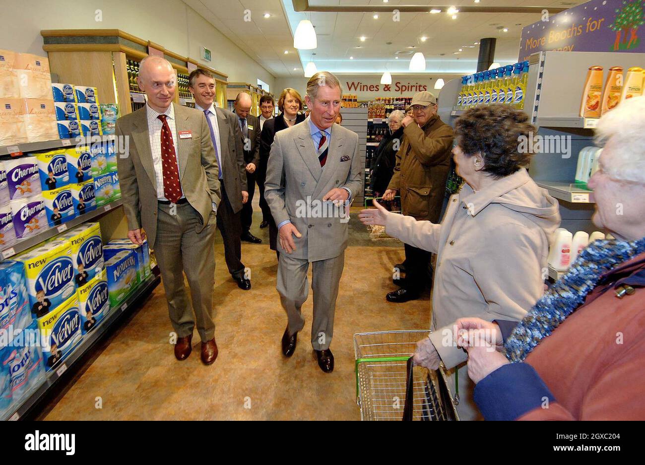 Prince Charles, Prince of Wales talks to a customer during a visit to a supermarket in Keswick, Cumbria, which is committed to local sourcing of produce, meeting suppliers and local farmers on February 5, 2007. Anwar Hussein/EMPICS Entertainment  Stock Photo