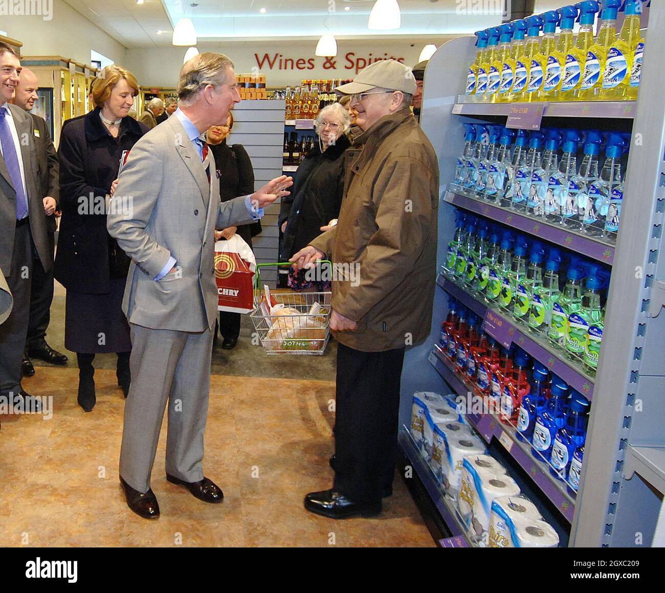 Prince Charles, Prince of Wales talks to a customer during a visit to a supermarket in Keswick, Cumbria, which is committed to local sourcing of produce, meeting suppliers and local farmers on February 5, 2007. Anwar Hussein/EMPICS Entertainment  Stock Photo