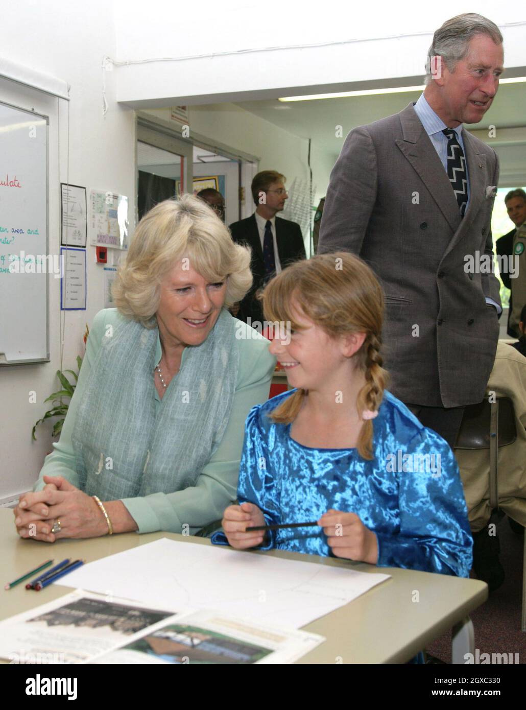 Prince Charles, Prince of Wales and Camilla, Duchess of Cornwall meet pupils taking part in a project about Tudor times when they visit the English Speaking School in Doha, Qatar on February 25, 2007. Stock Photo