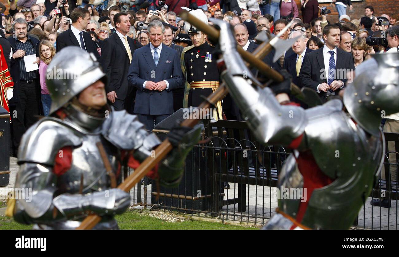 Prince Charles, Prince of Wales watches an historical re-enactment during a visit and reception at the Tower of London to launch British Tourism Week on March 12, 2007. Stock Photo