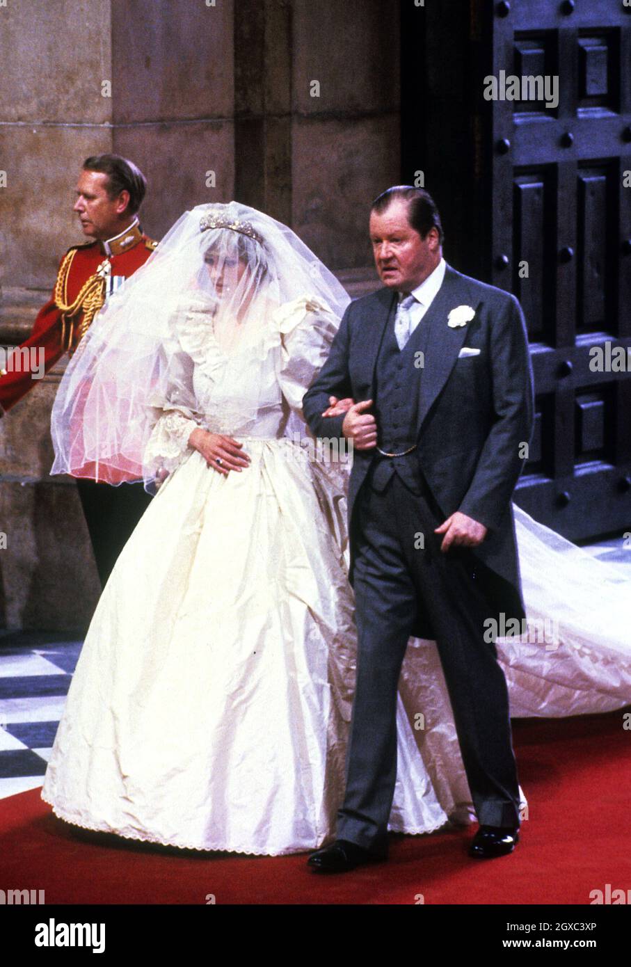Diana, Princess of Wales is led down the aisle of St. Paul's Cathedral by her proud father, Earl Spencer, on her wedding to Prince Charles, Prince of Wales on 29 July 1981. Stock Photo