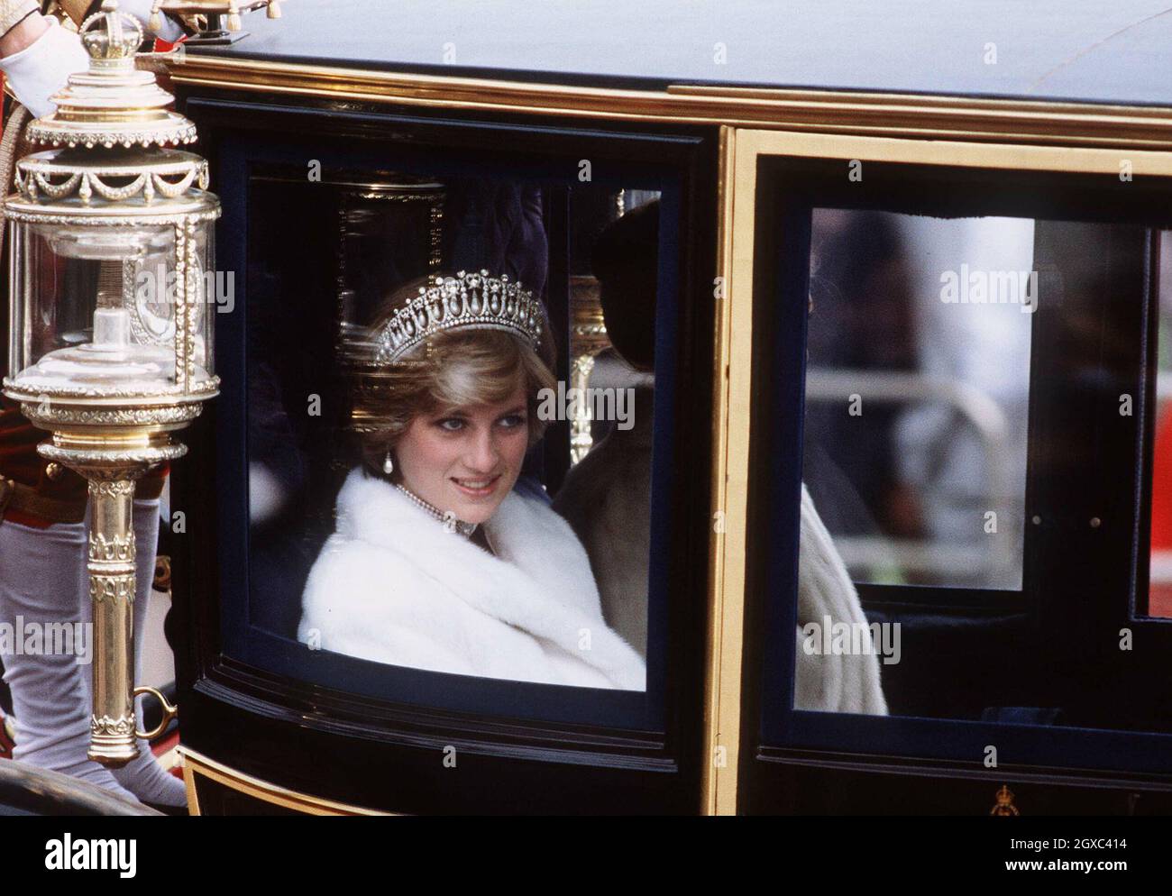 Diana, Princess of Wales, rides in a carriage on her way to the State  Opening of Parliament in November 1981. She is travelling in the Glass Coach  used for her wedding Stock