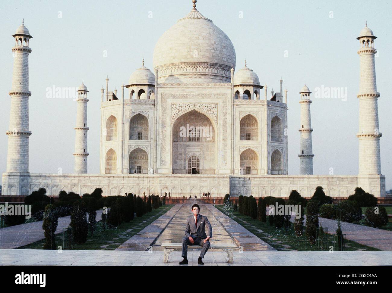 Prince Charles, Prince of Wales poses outside the Taj Mahal during his visit to India in 1980. Twelve years later the Princess of Wales posed alone in the same spot bringing attention to the loneliness of her marriage. Stock Photo