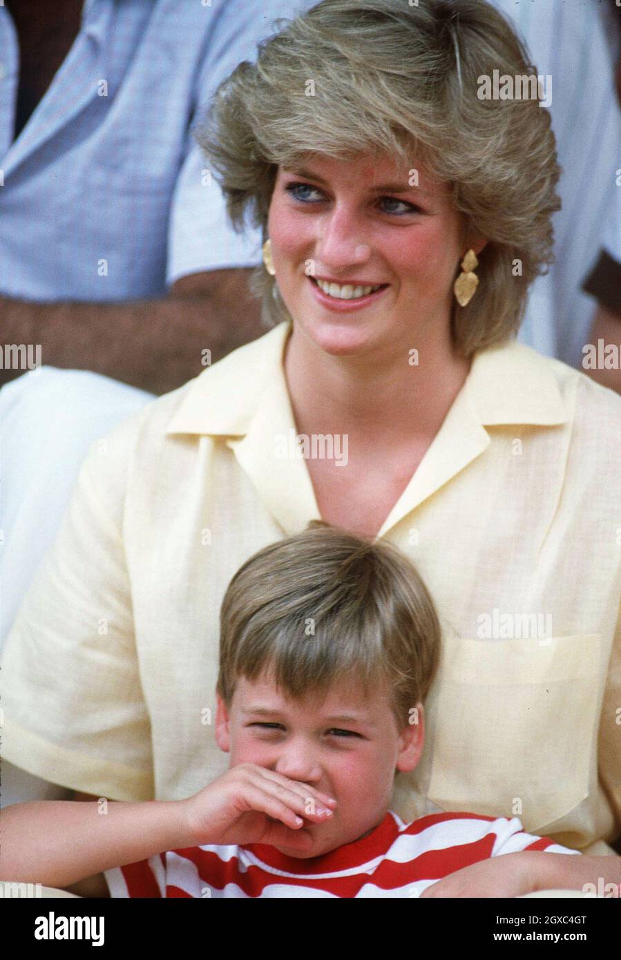 Diana, Princess of Wales, holds Prince William on holiday in Majorca, Spain on August 10, 1987. Stock Photo