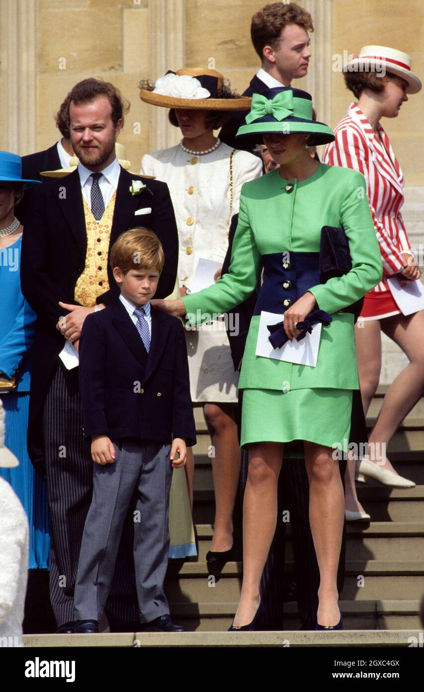 Diana, Princess of Wales, and Prince Harry attend the wedding of Lady Helen Windsor to Tim Taylor at St. George's Chapel, Windsor on July 18, 1992. Stock Photo