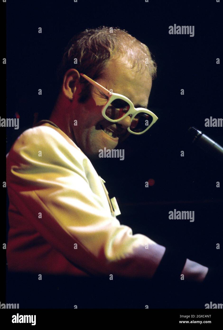 Elton John live in concert in London, circa 1975. Stock Photo