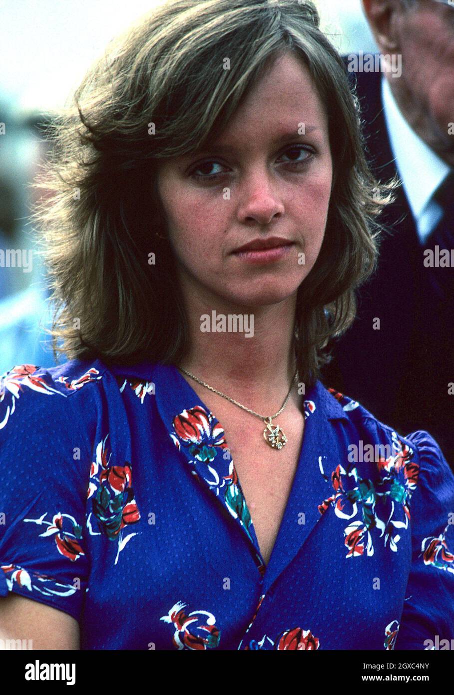 Sabrina Guinness watches Prince Charles, Prince of Wales play a polo match in Windsor Great Park, Windsor in August 1979. Sabrina Guinness dated the Prince during the 1970's. Sabrina is close to Paul McCartney and the two have recently been photographed having dinner together. Stock Photo