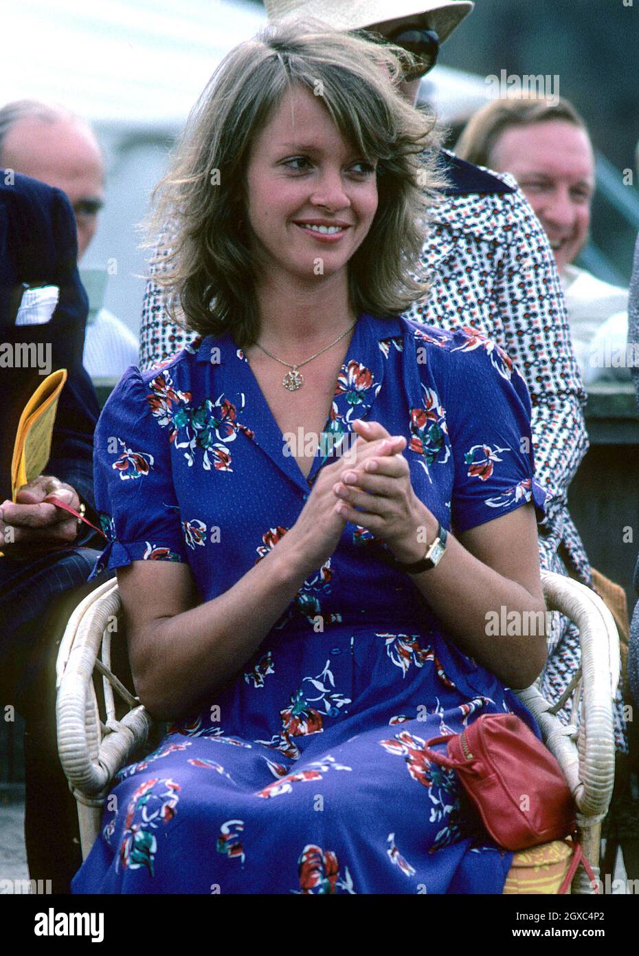 Sabrina Guinness watches Prince Charles, Prince of Wales play a polo match in Windsor Great Park, Windsor in August 1979. Sabrina Guinness dated the Prince during the 1970's. Sabrina is close to Paul McCartney and the two have recently been photographed having dinner together. Stock Photo