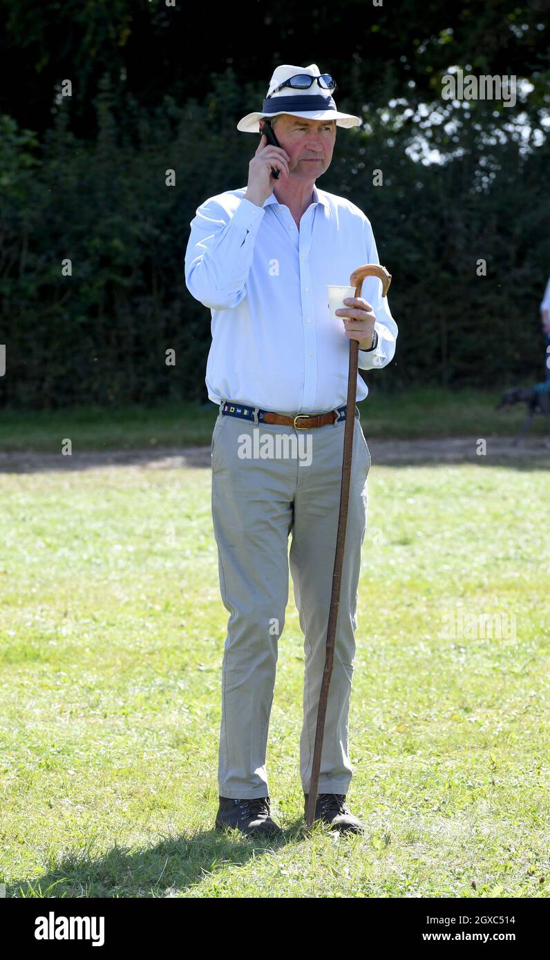 Sir Timothy Laurence chats on his mobile phone during the Gatcombe Horse Trials at Gatcombe Park on September 14, 2019 Stock Photo