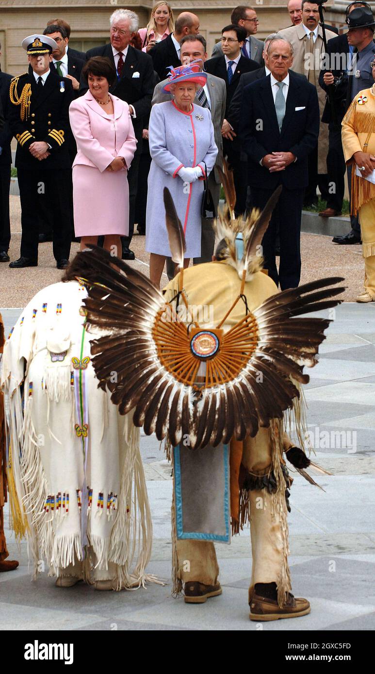 Queen Elizabeth II and Prince Philip, Duke of Edinburgh watch a Native ...