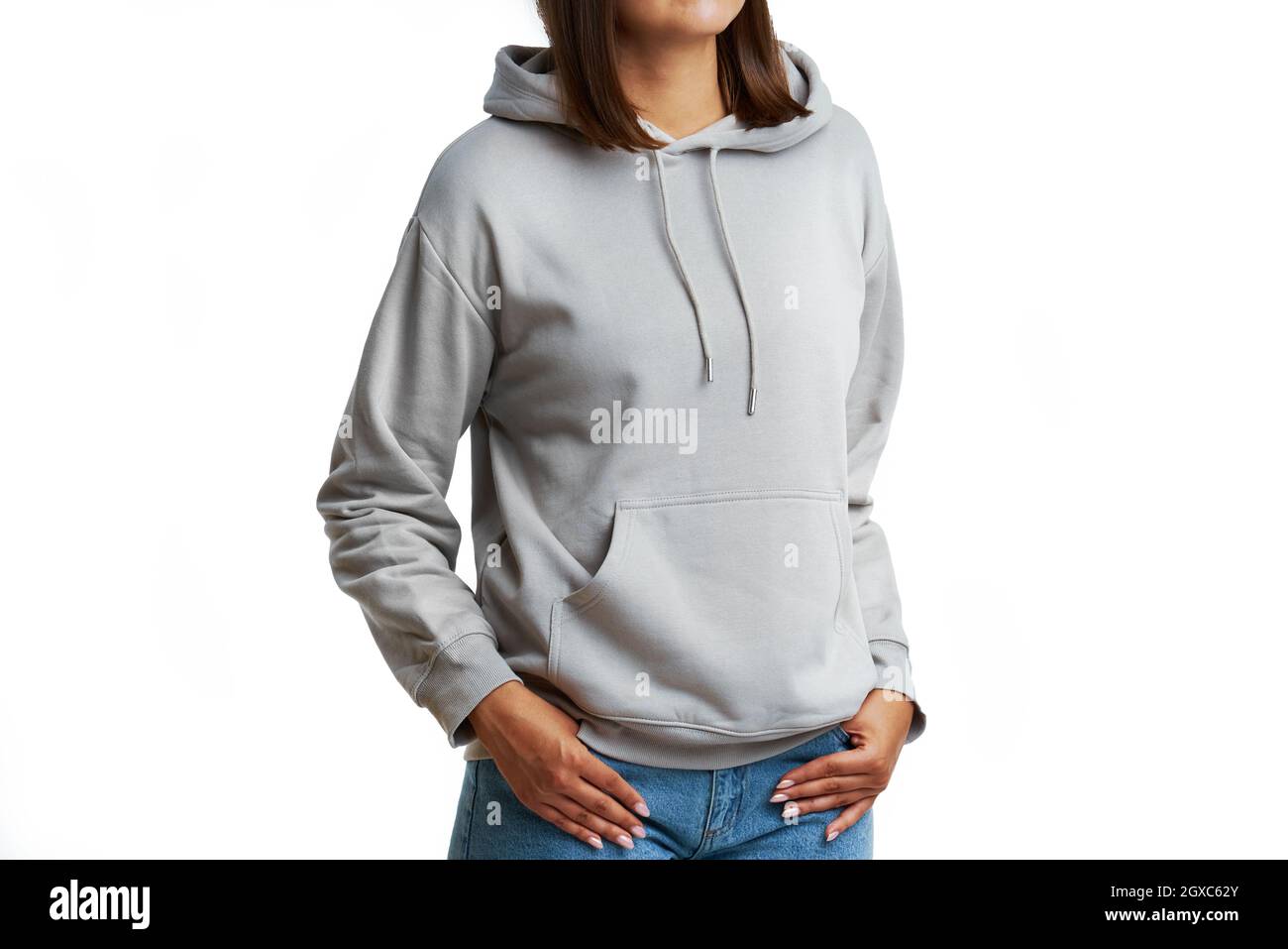 Young woman in gray hoodie isolated Stock Photo Alamy