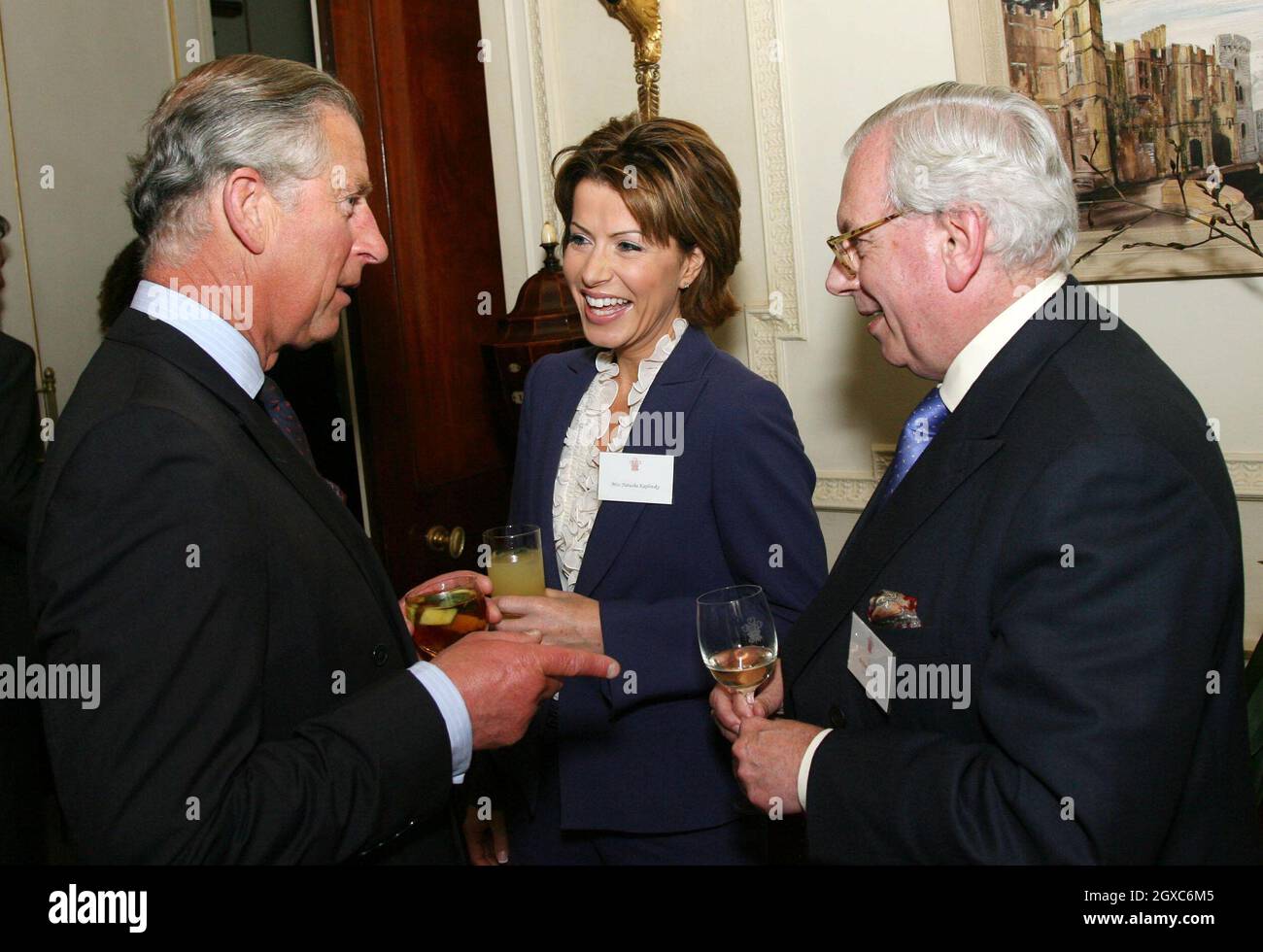 Prince Charles, Prince of Wales chats to Natasha Kaplinsky and David Starkey during a reception for the Royal Television Society at Clarence House in London on May 22, 2007. Stock Photo