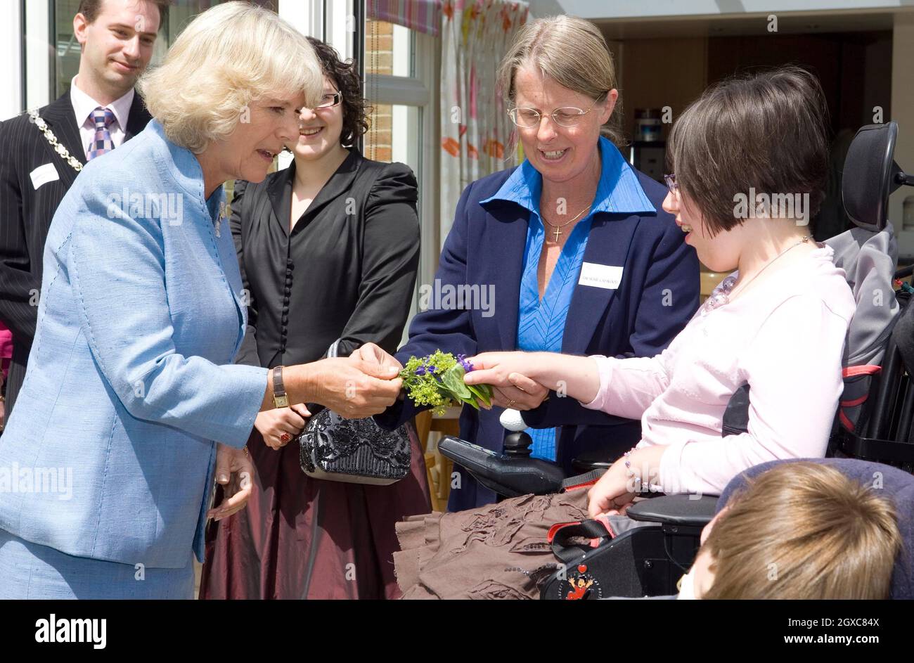 Camilla, Duchess of Cornwall receives a bouquet of flowers as she visits Helen and Douglas House, a hospice and respite care centre for children and young adults, in Oxford. Stock Photo